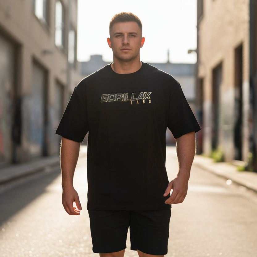 GXL Men’s Oversize Gorilla Back Tee worn by a model in an urban setting, showcasing bold style and comfort.